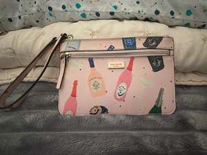 Kate Spade Shore Street Tinie Champagne Bottles Pink Wristlet